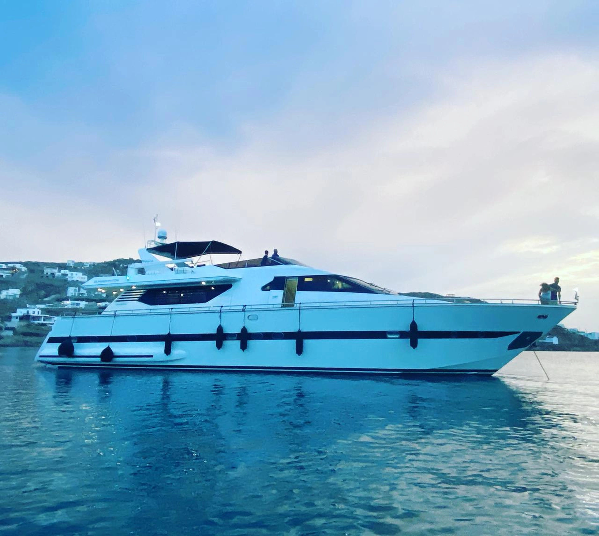 Mykonos Private Luxury Yacht Cruise | Full-Day Tour to Delos & Rhenia or South with a luxury motor yacht Cantieri Itaversil 82 Golden Yachting and Sailing