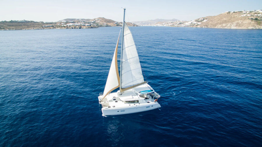 Sail the Mykonos Coast: Lagoon 420 Catamaran Cruise (Semi-Private) Golden Yachting and Sailing