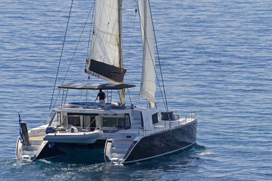 Mykonos Delos, Rhenia & South Beaches Catamaran Cruise | Lagoon 50 Golden Yachting and Sailing