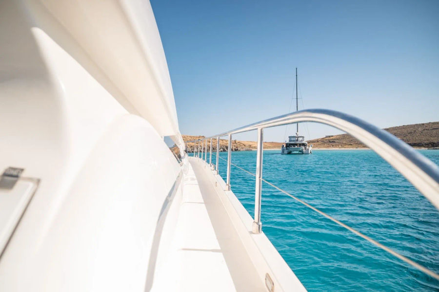 Mykonos Yacht Charter – Ferretti 620 Cruise to Delos & Rhenia or South Beaches | Half-Day or Full-Day Golden Yachting and Sailing