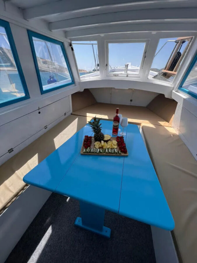 Mykonos Half-Day Private Cruise on a Traditional Caique in South Beaches Golden Yachting and Sailing